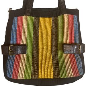 Vintage artisanal bag, with embroiled colorful details and leather details.